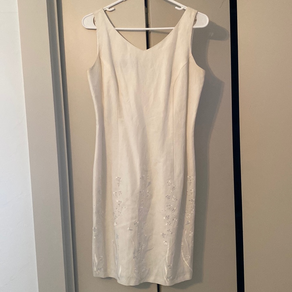 Donna Morgan Size 4. White Dress with sewn and bead details.